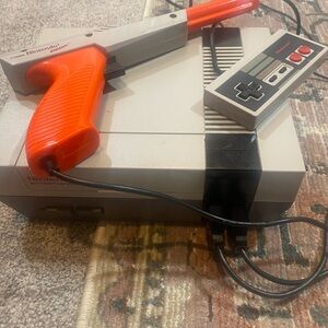 Nintendo Console with Gray and Orange Accessories